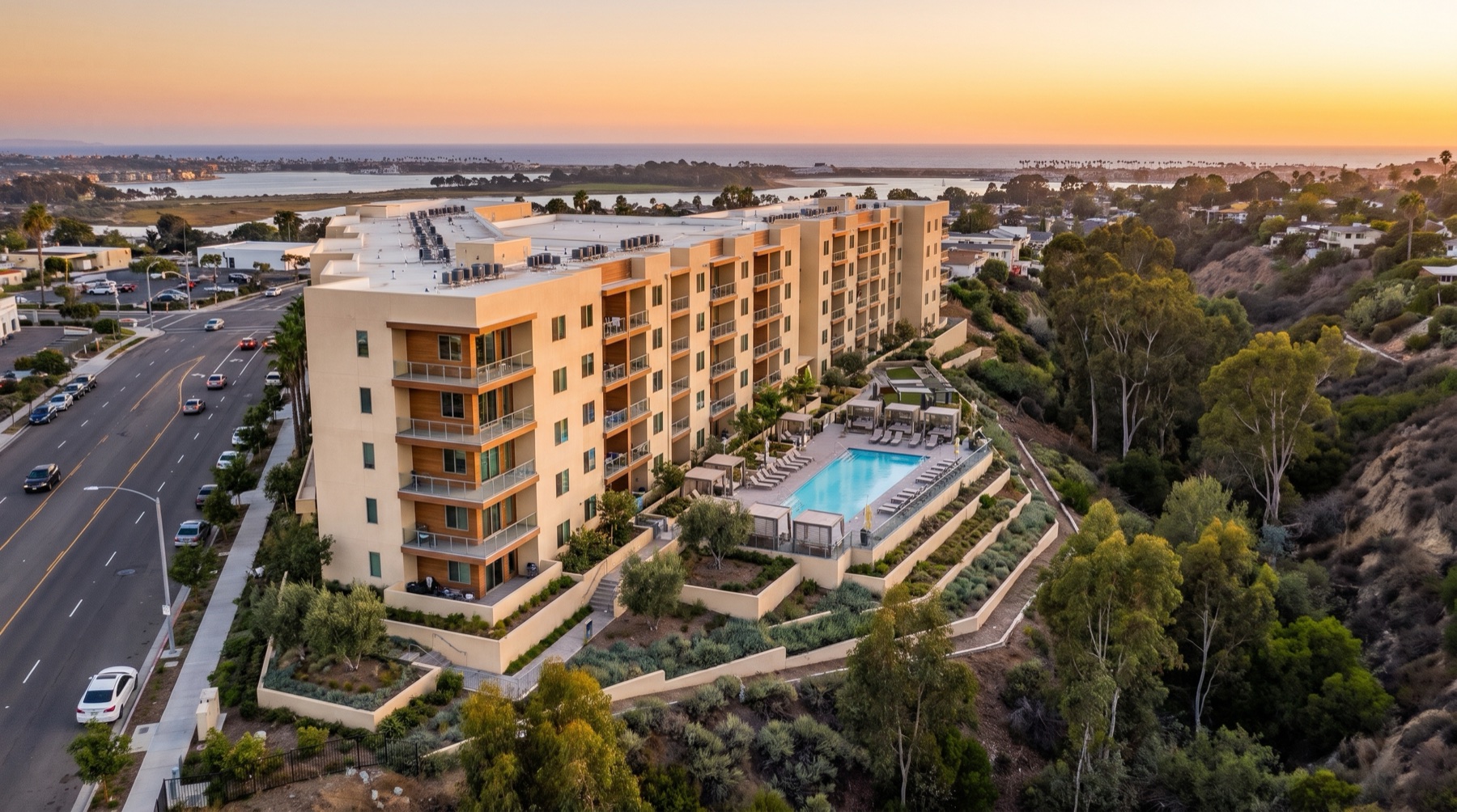 Visualization of a canyon-edge apartment community with ocean views